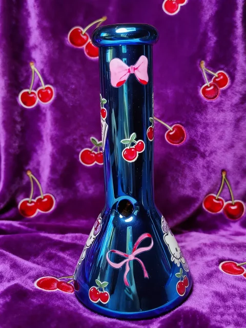Hello Kitty “Deep Blue Chrome Cherry” Beaker Glass Bong Cute, Bold, and Futuristic Hello Kitty “Deep Blue Chrome Cherry” Beaker Glass Bong | Cute, Bold, and Futuristic