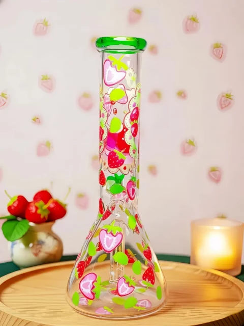Hello Kitty strawberry beaker bong with green accents and clear glass. Fresh garden design, sweet summer vibes, smooth hits for Sanrio fans. Hello Kitty strawberry beaker bong with green accents and clear glass. Fresh garden design, sweet summer vibes, smooth hits for Sanrio fans.